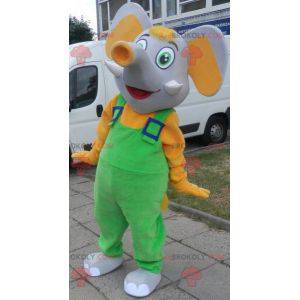 Mascote elefante cinza e amarelo vestido de macacão -