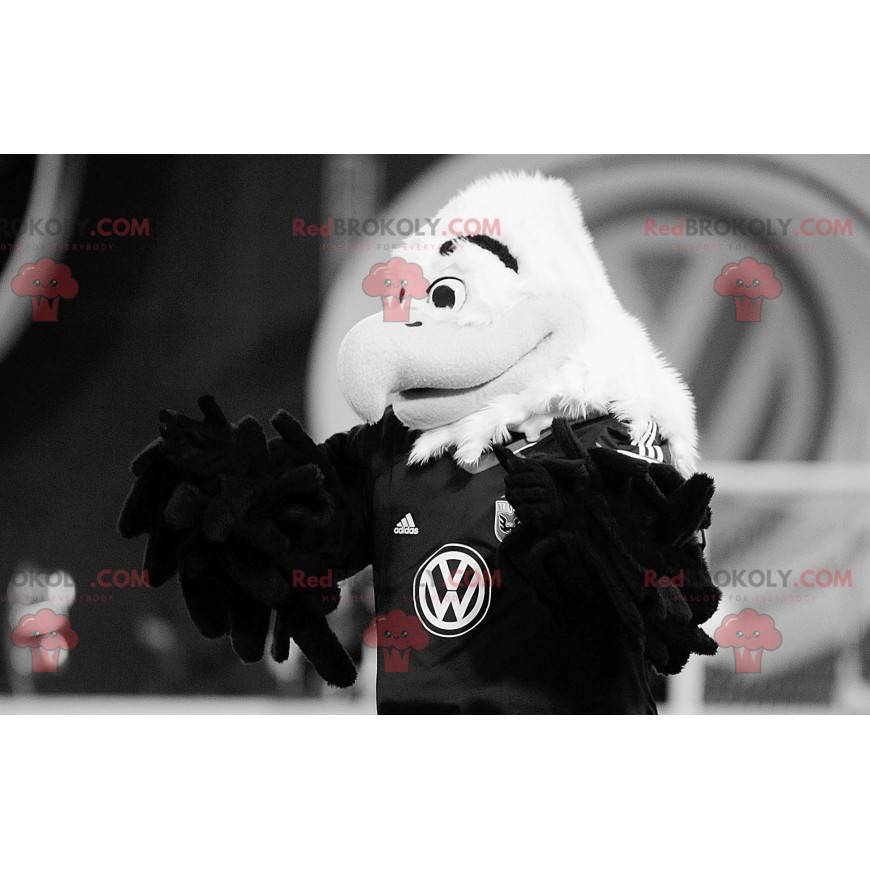 Bílý a žlutý orel maskot ve sportovním oblečení - Redbrokoly.com Bílý a žlutý orel maskot ve sportovním oblečení - Redbrokoly.com