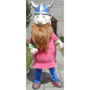 Mascotte de Viking barbu habillé en rose avec un casque -