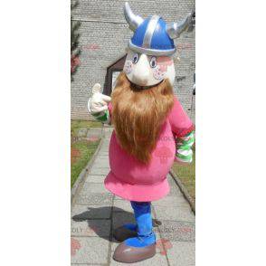 Mascota vikinga barbuda vestida de rosa con casco -