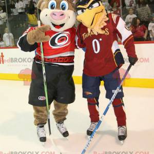2 mascots a brown pig and a beige eagle - Redbrokoly.com