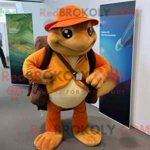 Hnědá oranžová postava...