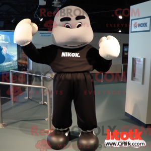 Sort boksehandske maskot...