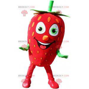 Mascotte de fraise géante. Mascotte de fruit rouge et vert -