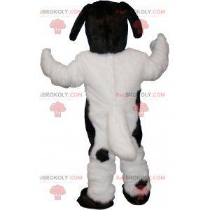 Mascota de perro blanco y negro peludo y lindo - Redbrokoly.com