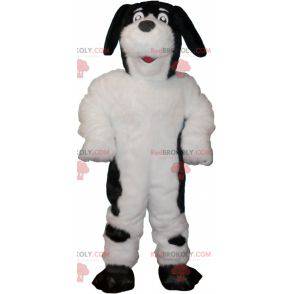 Haariges und süßes weißes und schwarzes Hundemaskottchen -