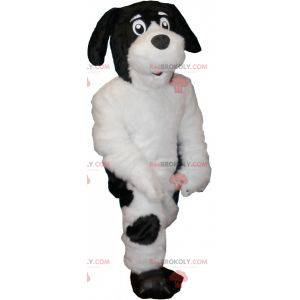 Haariges und süßes weißes und schwarzes Hundemaskottchen -