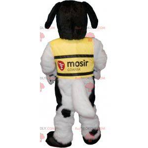 Mascote cachorro peludo preto e branco com colete amarelo -