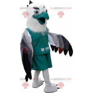 Mascote abutre cinza branco e preto vestido de verde -