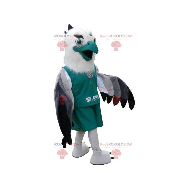 White and black gray vulture mascot dressed in green -