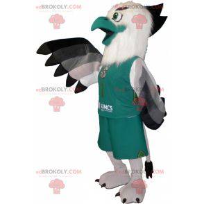 White and black gray vulture mascot dressed in green -