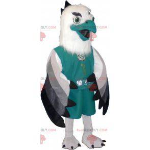 Mascote abutre cinza branco e preto vestido de verde -