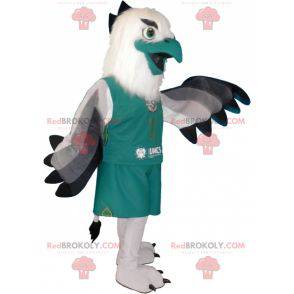 Mascotte de vautour gris blanc et noir habillé en vert -