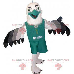 White and black gray vulture mascot dressed in green -