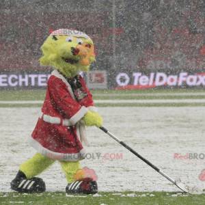 Leão amarelo mascote vestido de Papai Noel - Redbrokoly.com