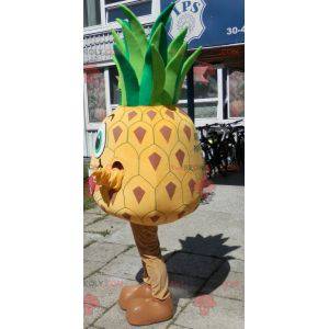 Mascotte d'ananas jaune et vert géant. Costume d'ananas -