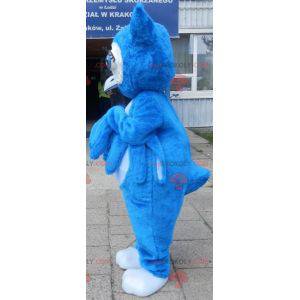 Reusachtige blauwe uil mascotte met grote blauwe ogen -