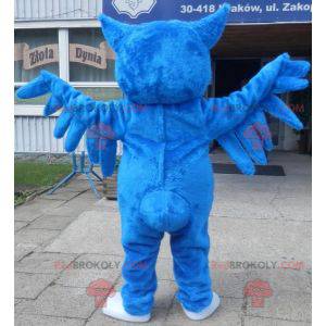 Mascote gigante coruja azul com grandes olhos azuis -