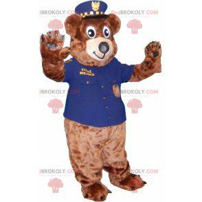 Mascote urso de pelúcia marrom em uniforme de policial -