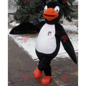 Penguin mascot black white and orange. Penguin costume -