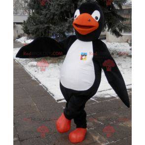 Pingvin maskot svart vit och orange. Penguin kostym -