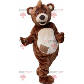 Brown and white teddy bear mascot with a crest - Redbrokoly.com