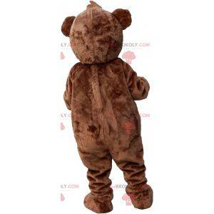 Brown and white teddy bear mascot with a crest - Redbrokoly.com