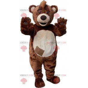 Brown and white teddy bear mascot with a crest - Redbrokoly.com