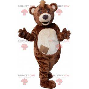 Brown and white teddy bear mascot with a crest - Redbrokoly.com