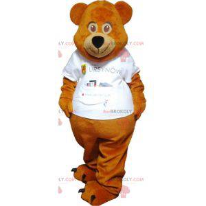Mascota del oso de peluche marrón vestida de blanco -