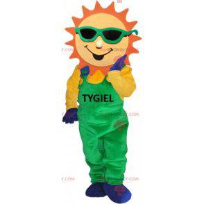 Sun mascotte vestito con una tuta verde - Redbrokoly.com