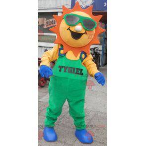 Mascote do sol vestido de macacão verde - Redbrokoly.com