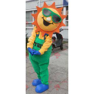 Sun mascot dressed in green overalls - Redbrokoly.com