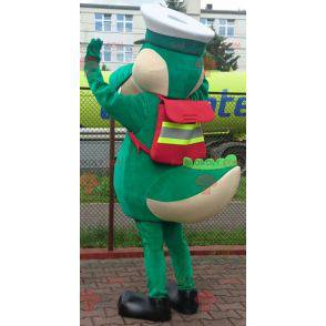 Mascotte coccodrillo verde con berretto da capitano -