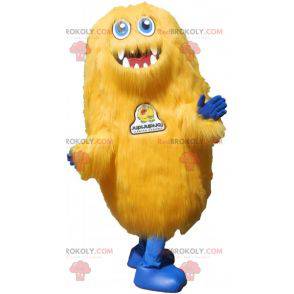 Mascotte de monstre jaune tout poilu. Mascotte de grizzli -