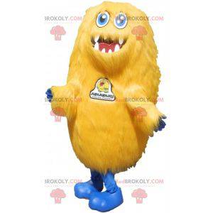 Mascotte de monstre jaune tout poilu. Mascotte de grizzli -