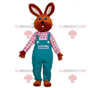 Rabbit mascot dressed in overalls. Farmer mascot -