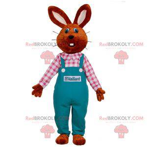 Rabbit mascot dressed in overalls. Farmer mascot -