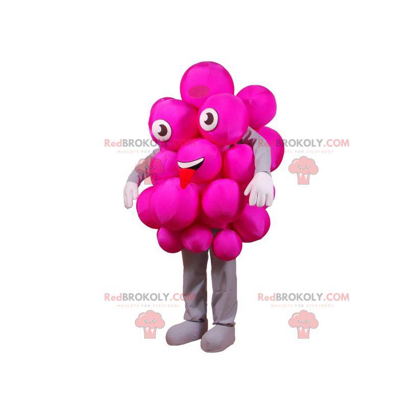 Maskottgrupp av rosa druvor. Festlig rosa maskot -
