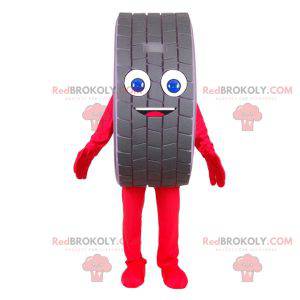 Very smiling giant tire mascot. Car wheel mascot -