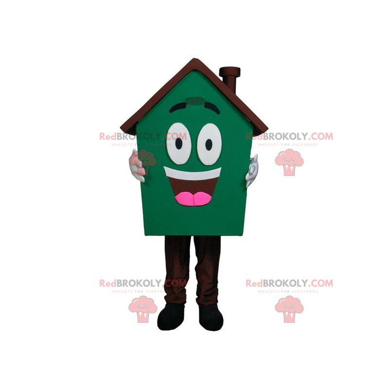 Mascote gigante da casa muito sorridente verde e marrom -