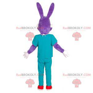 Mascotte de lapin violet en tenue de chirurgien. -