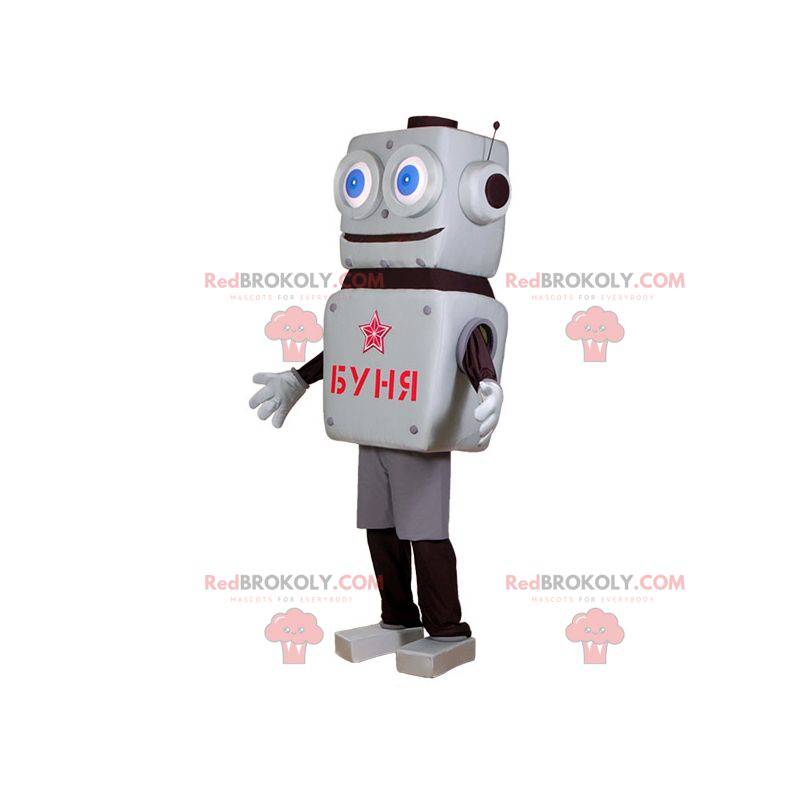 Mascota robot gris y negro con grandes ojos azules -