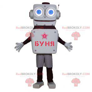 Mascotte robot grigio e nero con grandi occhi azzurri -