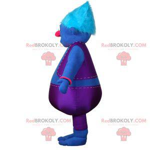 Mascote gordinho do boneco de neve azul vestido com uma roupa