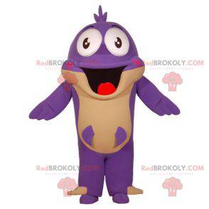 Mascota de pescado púrpura y beige divertido y sonriente -
