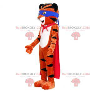 Mascotte de tigre orange et noir avec un bandeau et une cape -