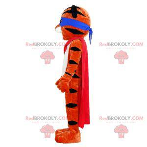 Orange and black tiger mascot with a headband and a cape -