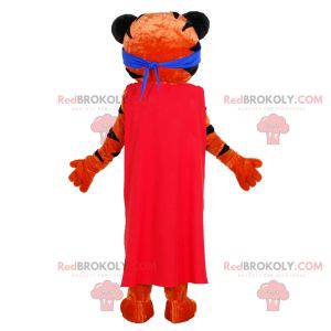 Oranje en zwarte tijger mascotte met een hoofdband en een cape