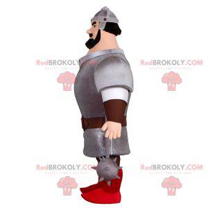 Mascotte cavaliere molto muscoloso con armatura e casco -